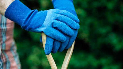 Protective gloves and shovel