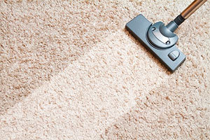Carpet cleaning by vacuum